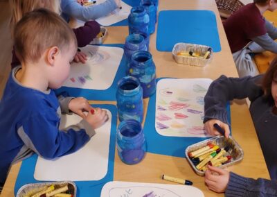 Children colouring at Star Seedlings