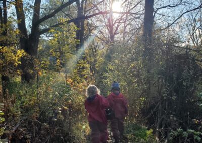 Children on a walk through the brush
